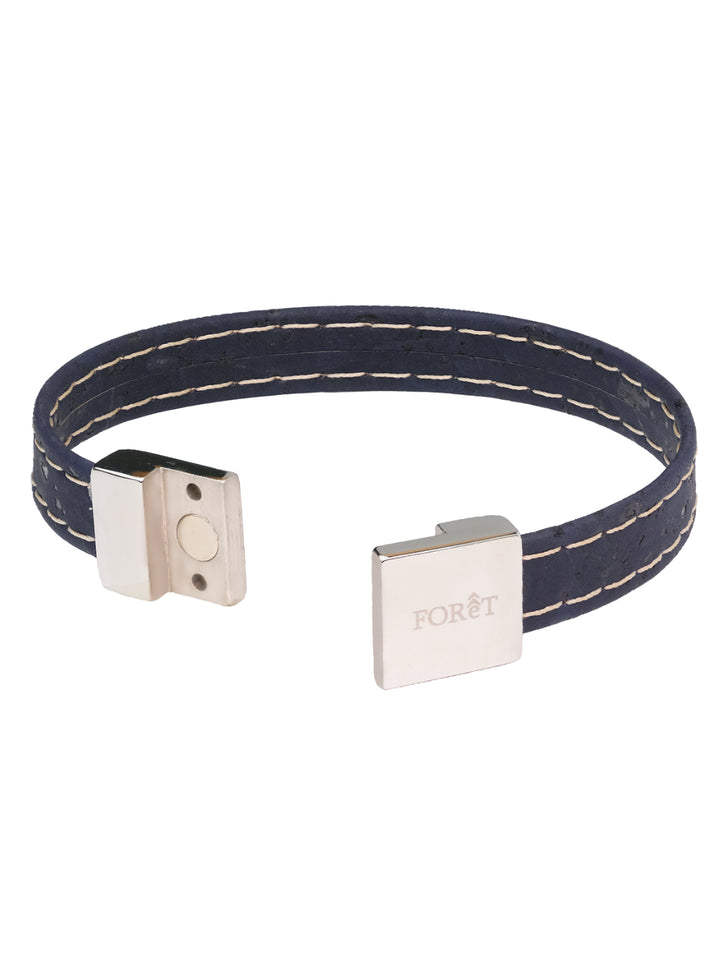Introducing Maritime Elegance Embroidered Cork Bracelet: Navy-blue sophistication meets modern design. Lightweight, magnetic clasp, and elegantly packaged for any occasion.
